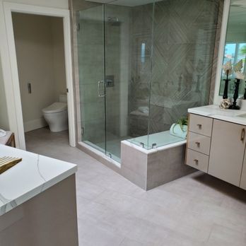 Mitchell Tile And Stone - a bathroom with a walk in shower - Flooring Near Me - San Clemente, California Mitchell Tile And Stone - a bathroom with a walk in shower - Flooring Near Me - San Clemente, California