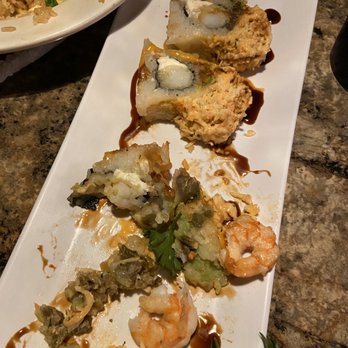 Wasabi - SPURS ROLL with Black Avocado. Fried rice was JUST OKAY very mushy in my opinion. - Sushi Bars Near Me - San Antonio, Texas Wasabi - SPURS ROLL with Black Avocado. Fried rice was JUST OKAY very mushy in my opinion. - Sushi Bars Near Me - San Antonio, Texas
