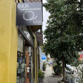 QED Coffee - a sign for a coffee shop - Coffee & Tea Near Me - Seattle, Washington QED Coffee - a sign for a coffee shop - Coffee & Tea Near Me - Seattle, Washington