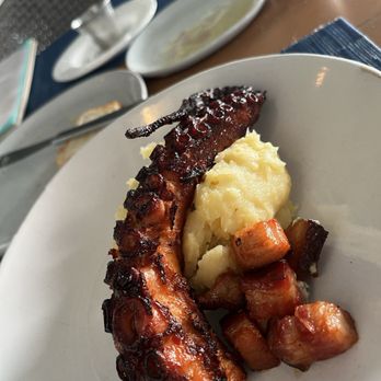 Calusa - This tentacle in particular was so thick and perfectly cooked with the Yukon Gold Mashed Potatoes! - American Near Me - Key Largo, Florida