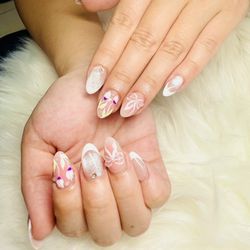 L & K Nails and Spa - Cat eyes with design tulips flowers..