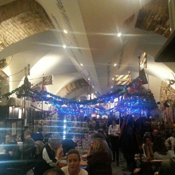 Kapuziner Keller - Length of restaurant dressed in holiday style. - German Near Me - Trieste, TS