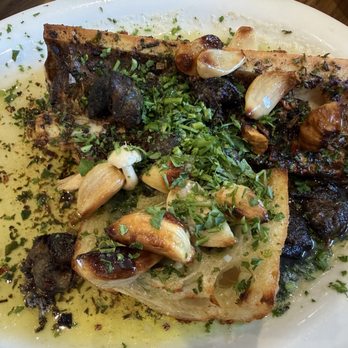 Brigitte Bistro - Escargot with bone marrow in roasted garlic - French Near Me - Petaluma, California Brigitte Bistro - Escargot with bone marrow in roasted garlic - French Near Me - Petaluma, California