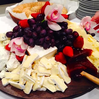 Anne Booth Catering - Cheese Platter: Manchego, aged goat cheese, soft-ripened cheeses, guava paste, and orange blossom honey - Caterers Near Me - Mount Vernon, New York