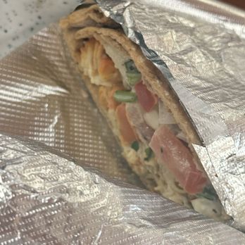 Al Aseel Grill & Cafe - Chicken wrap, a different view - Middle Eastern Near Me - Houston, Texas Al Aseel Grill & Cafe - Chicken wrap, a different view - Middle Eastern Near Me - Houston, Texas