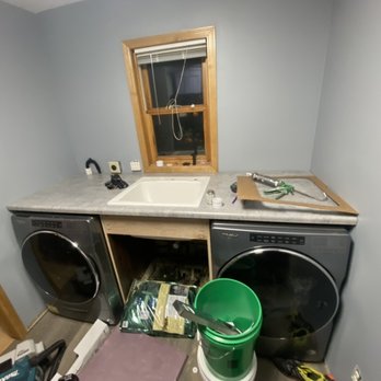 Chuck’s Handyman Services - New laminate countertop and wash basin along with custom cabinet for new mud room.  New LVP floor too. - Handyman Near Me