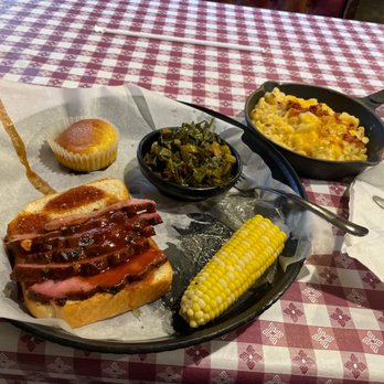 Riverside BBQ & Grill - Brisket served on Texas toast with collards, Mac, corn and cornbread. Absolutely delicious and quickly served! - Burgers Near Me - Quincy, Illinois