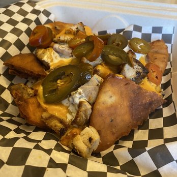 Pints & Union - Naanchos with yogurt-marinated chicken to go. - Pubs Near Me - New Albany, Indiana