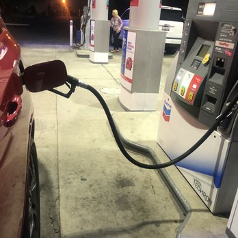 Chevron - a red car at a gas station - Gas Stations Near Me - Sloughhouse, California