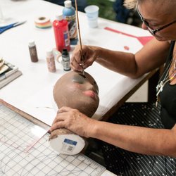OFFcenter Community Arts Gallery - Painting the head for a sculpture project.