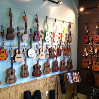 North Carolina Ukulele Academy - Wall of Ukuleles - Musical Instruments & Teachers Near Me - Wilmington, North Carolina North Carolina Ukulele Academy - Wall of Ukuleles - Musical Instruments & Teachers Near Me - Wilmington, North Carolina