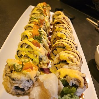 Cafe Mochi - Godzilla roll (left) and chicken teriyaki roll (right) - Sushi Bars Near Me - St Louis, Missouri