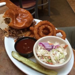 Pulled Pork sandwich with the most amazing onion rings. Pulled Pork sandwich with the most amazing onion rings.