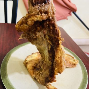 Kumare Express - a piece of meat on a plate - Filipino Near Me - Vancouver, British Columbia