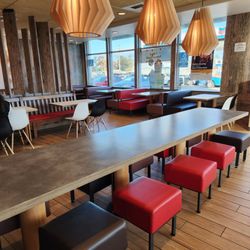 McDonald's - Decent sized dining area, unlocked bathrooms (no paper, blow dry only).