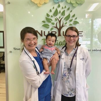 Nurture Pediatrics - Dr.Pate with Dr.Rushing after piercing my baby's ears! Love that they offer ear piercing in a safe environment. - Pediatricians Near Me - Belliare, Texas