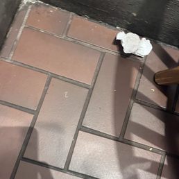 This is the floor at the table we were seated at in Rosenberg. Nasty!! We left. This is the floor at the table we were seated at in Rosenberg. Nasty!! We left.