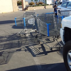 Firebaugh Super Market - Carts all over the parking lot