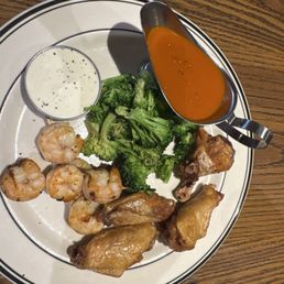 Chicken wings, grilled shrimp and broccoli