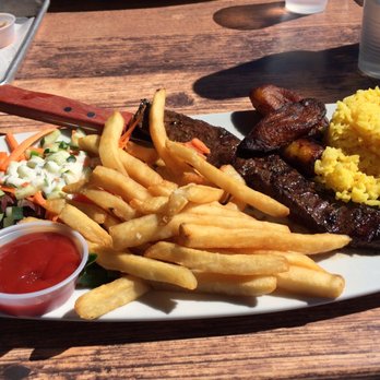 Sofrito Latin Cafe - Churrasco Argentinian steak, french fries, yellow Cuban rice, sweet Plaintain's, House salad, - Latin American Near Me - Orlando, Florida Sofrito Latin Cafe - Churrasco Argentinian steak, french fries, yellow Cuban rice, sweet Plaintain's, House salad, - Latin American Near Me - Orlando, Florida