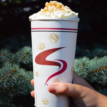 Aroma Joe's - a hand holding a cup of coffee - Coffee & Tea Near Me - Rochester, New Hampshire Aroma Joe's - a hand holding a cup of coffee - Coffee & Tea Near Me - Rochester, New Hampshire