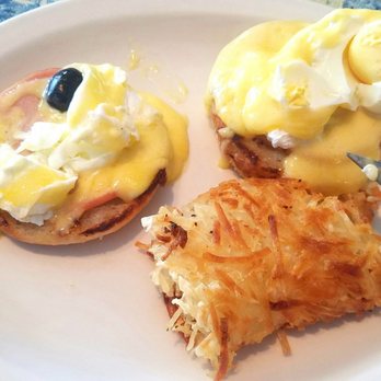 Moke's Bread & Breakfast - Ruined eggs benedict... egg on left is missing the yolk, egg on right is hard boiled. - Breakfast & Brunch Near Me - Kailua, Hawaii