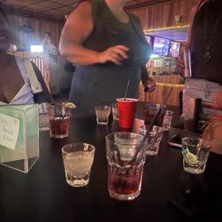 Tommys Oasis - Shots & drink. They fill the glasses to the top!!