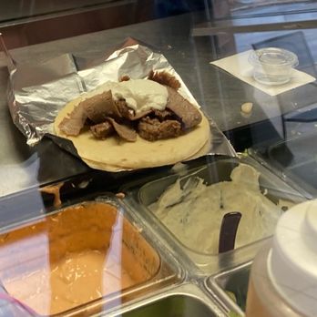 Gyropolis - Gyropolis Gyro being made - Greek Near Me - Bloomington, Minnesota Gyropolis - Gyropolis Gyro being made - Greek Near Me - Bloomington, Minnesota