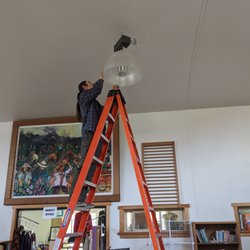 Olympic Trading Post - Putting up the new LED's Whoot! We save money, you save money...