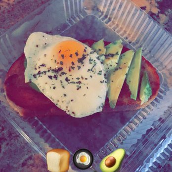Toast - Avocado toast with sunny side up egg (to go) - Breakfast & Brunch Near Me - New Orleans, Louisiana Toast - Avocado toast with sunny side up egg (to go) - Breakfast & Brunch Near Me - New Orleans, Louisiana