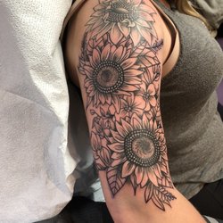 Invidia Tattoo and Piercing