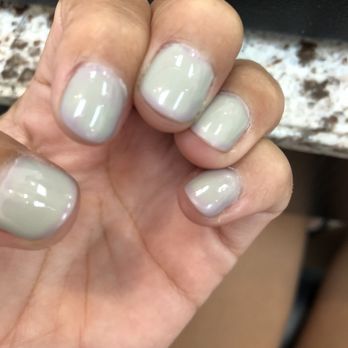 Panda Nails - The color was originally a light purple but it changed into a cloudy gray within 24hrs. You can see two different colors on the nail. - Nail Salons Near Me - Arcadia, California
