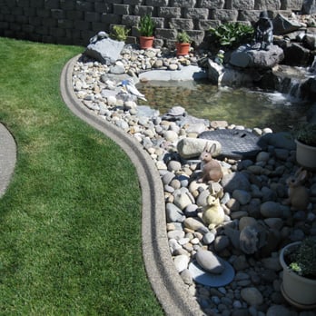 Create-A-Curb - Barrier between rocks and grass - Landscaping Near Me - Lacey, Washington