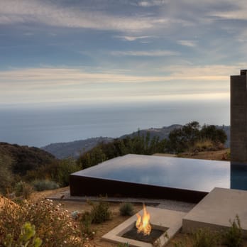 Aquatic Technology Pool & Spa - Vanishing edge pool finished with glass tile mosaics, gas fire feature, Malibu, California - Architects Near Me Aquatic Technology Pool & Spa - Vanishing edge pool finished with glass tile mosaics, gas fire feature, Malibu, California - Architects Near Me