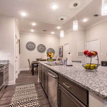 Bella Ridge South - Kitchen with Custom-Cut Granite Countertops - Apartments Near Me - River Ridge, Louisiana Bella Ridge South - Kitchen with Custom-Cut Granite Countertops - Apartments Near Me - River Ridge, Louisiana