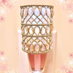 Bath & Body Works - The smell of Rose Lychee is so yummy ! I l love the wallflower design too