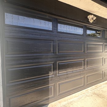 Garage Door Experts - GDX - Black rollup garage door that replaced our old single panel wood garage door. - Garage Door Services Near Me Garage Door Experts - GDX - Black rollup garage door that replaced our old single panel wood garage door. - Garage Door Services Near Me