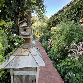 Robins Restaurant - Entrance, beautiful garden - New American Near Me - Cambria, California Robins Restaurant - Entrance, beautiful garden - New American Near Me - Cambria, California