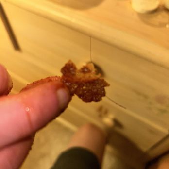 Hot Motha Clucker - Black hair in crust from chicken tender - Chicken Shop Near Me - Thousand Oaks, California Hot Motha Clucker - Black hair in crust from chicken tender - Chicken Shop Near Me - Thousand Oaks, California