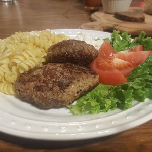 Photo of The Village House Kalina - La Mesa, CA, United States. "Russian Style" Meat Cutlets with a side of noodles and blue cheese dressing. Yum!!