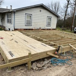Nash Outdoors - Beginning of framing an add on ( beams, joists, an sub floor )