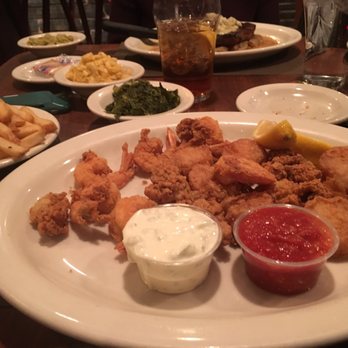 Colonnade - Seafood sampler, beat greens, mac and cheese, lima beans, and fries - Southern Near Me - Atlanta, Georgia Colonnade - Seafood sampler, beat greens, mac and cheese, lima beans, and fries - Southern Near Me - Atlanta, Georgia
