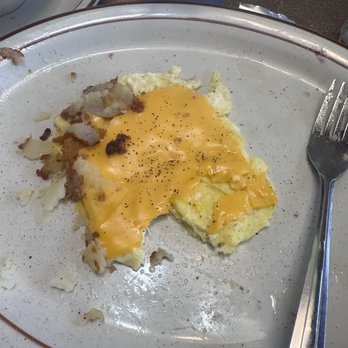 Huck Finn Restaurant - They literally just slapped american cheese on top of cold eggs and I didn't receive a refund nor new eggs. - Donuts Near Me - Chicago, Illinois