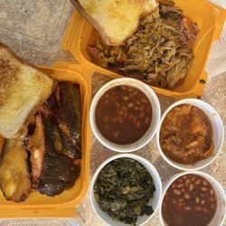 Lady Sugar Shack BBQ - Ribs platter and pulled pork platter, with sides of candied yams, collard greens, baked beans