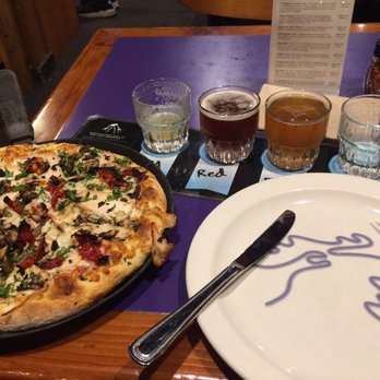 Moose's Tooth - The Solstice with a flight of the rotational beers. - Pizza Near Me - Anchorage, Alaska Moose's Tooth - The Solstice with a flight of the rotational beers. - Pizza Near Me - Anchorage, Alaska