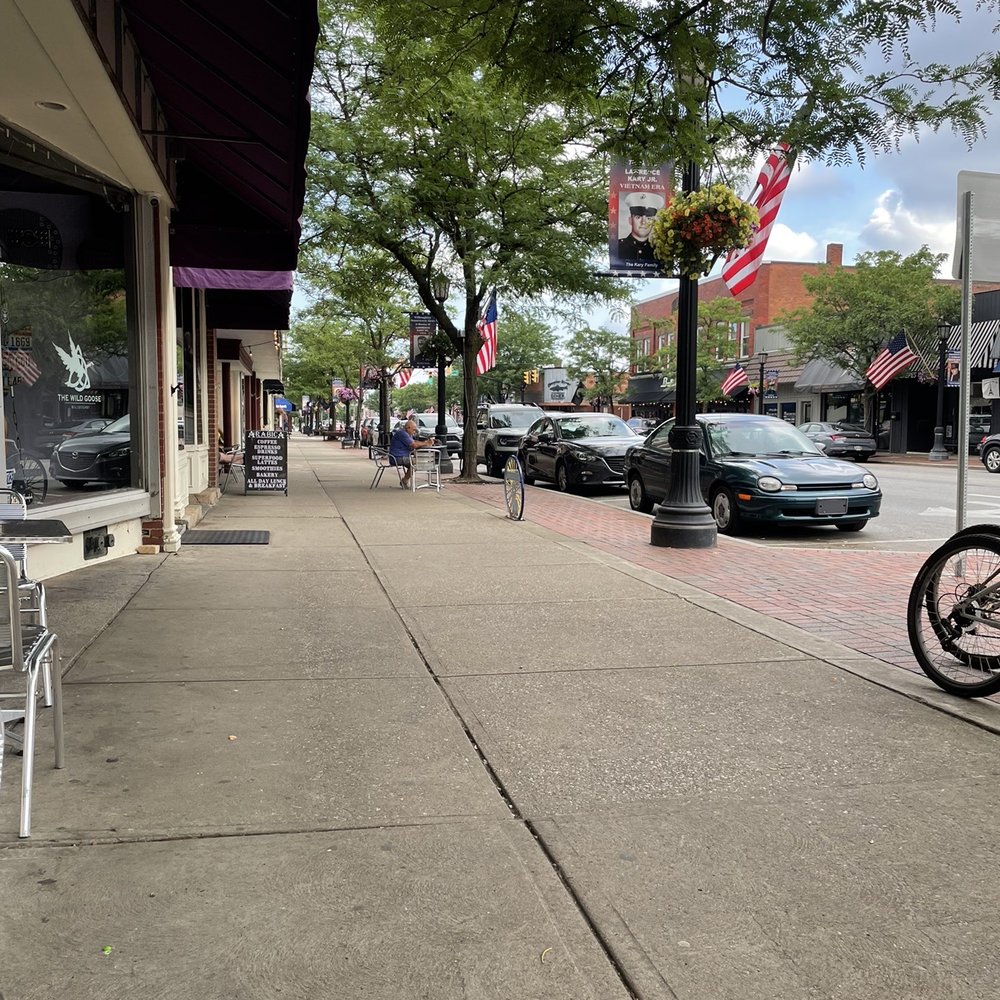Fionas Coffee Bar And Bakery - a bicycle parked on the sidewalk - Bagels Near Me - Willoughby, Ohio