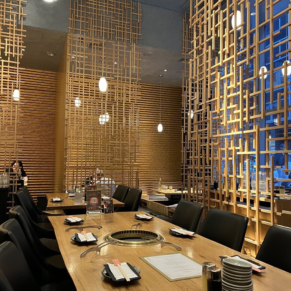 a dining room with a table and chairs a dining room with a table and chairs