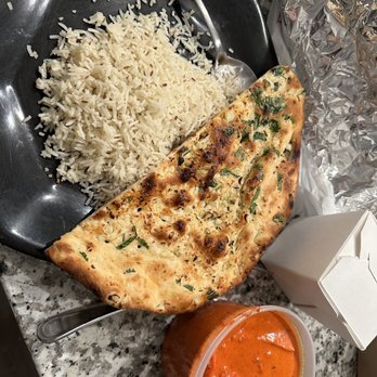 Curry in the Box - Butter Chicken basmati rice and garlic naan. - Indian Near Me - Fitchburg, Wisconsin Curry in the Box - Butter Chicken basmati rice and garlic naan. - Indian Near Me - Fitchburg, Wisconsin