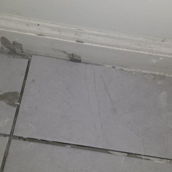 Royal Flooring - a tile floor in a bathroom - Flooring Near Me - Virginia Beach, Virginia