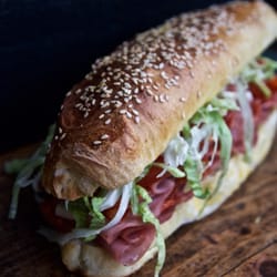 Italian Combo- Mortadella, Soppressata, Genoa, Shredded Lettuce, Provolone, Spicy Vinaigrette and Roasted Hot Pepper Jam